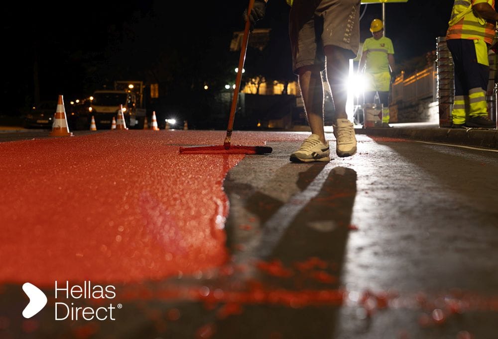 Safe Roads project's crew member fixing a crosswalk